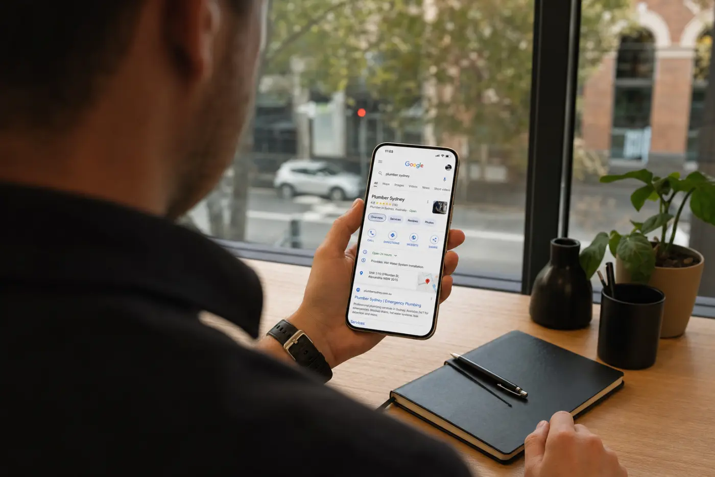 Sydney tradie checking phone after receiving an exclusive lead notification