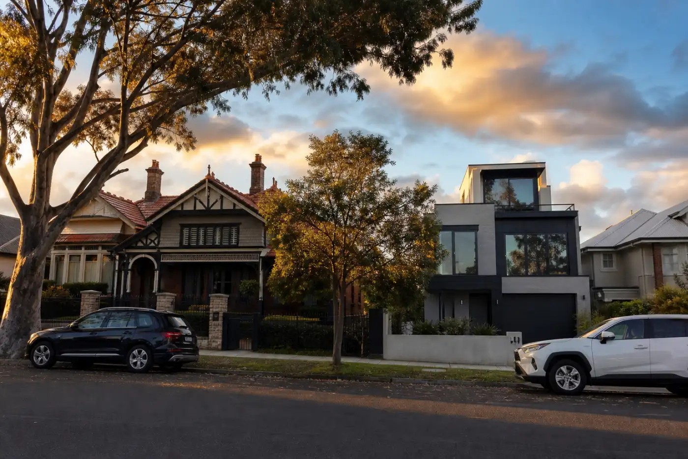 Residential Sydney suburban street at mid-afternoon with Federation and modern homes side by side